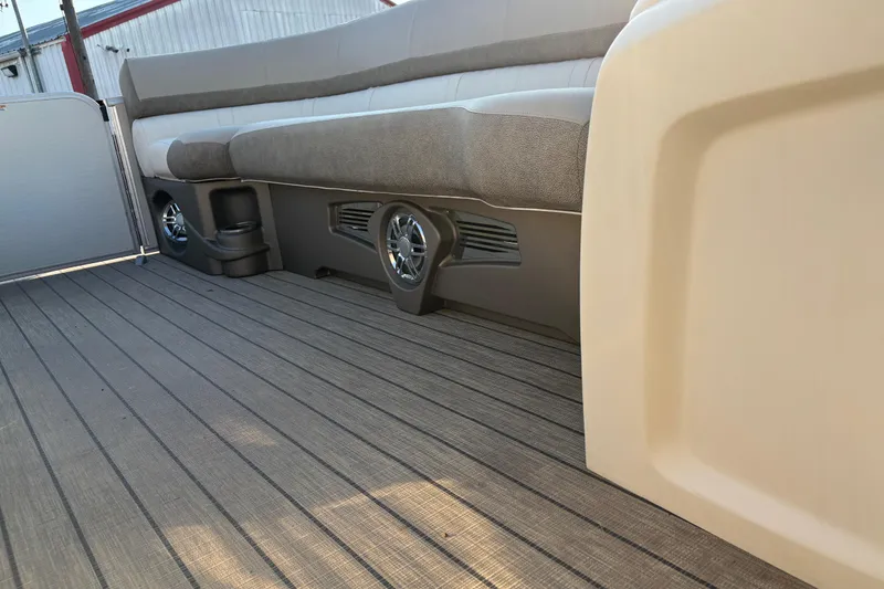 Slide: The Image of 2022 Avalon Catalina 2585 VRB boat interior with cushioned seating and sleek flooring. - 51