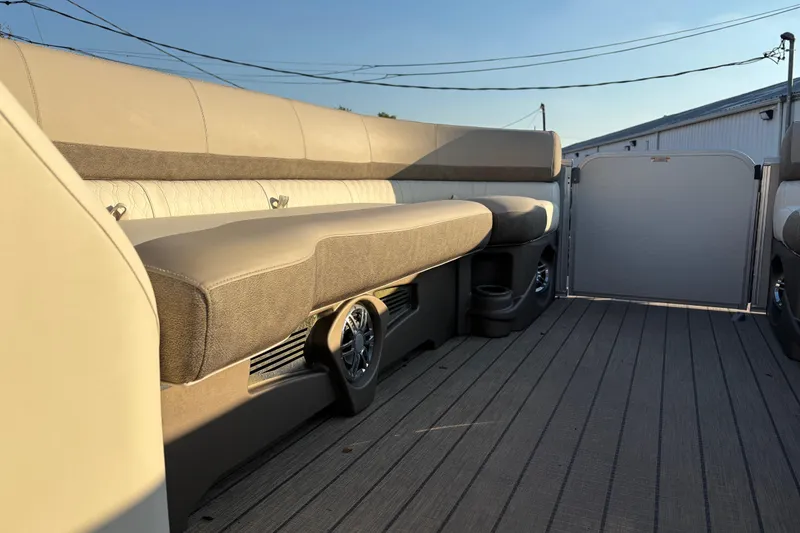 Slide: The Image of 2022 Avalon Catalina 2585 VRB boat interior with plush seating and modern design. - 52