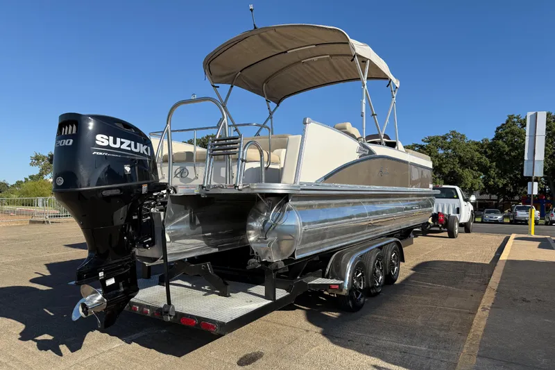 Slide: The Image of 2022 Avalon Catalina 2585 VRB pontoon boat with Suzuki engine on trailer. - 76