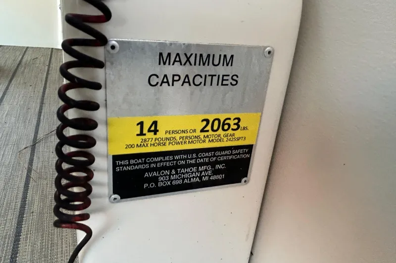 Slide: The Image of Luxurious seating on 2022 Avalon Catalina 2585 VRB boat with integrated speaker system. - 8