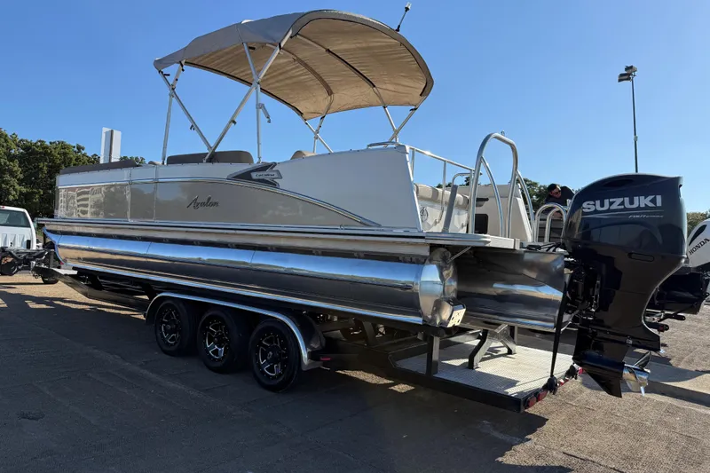 Slide: The Image of 2022 Avalon Catalina 2585 VRB pontoon boat with Suzuki 200 engine on trailer. - 85