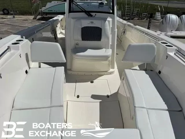 Slide: The Image of 2026 Cobia 320 Center Console with spacious deck and seating. - 9