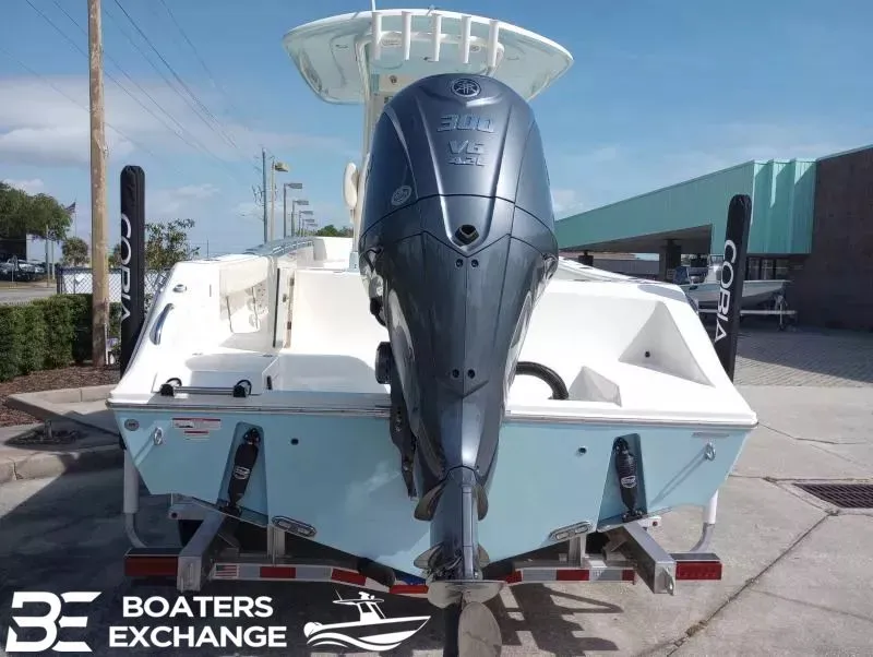 Slide: The Image of 2022 Cobia 240 Center Console with outboard motor. - 3