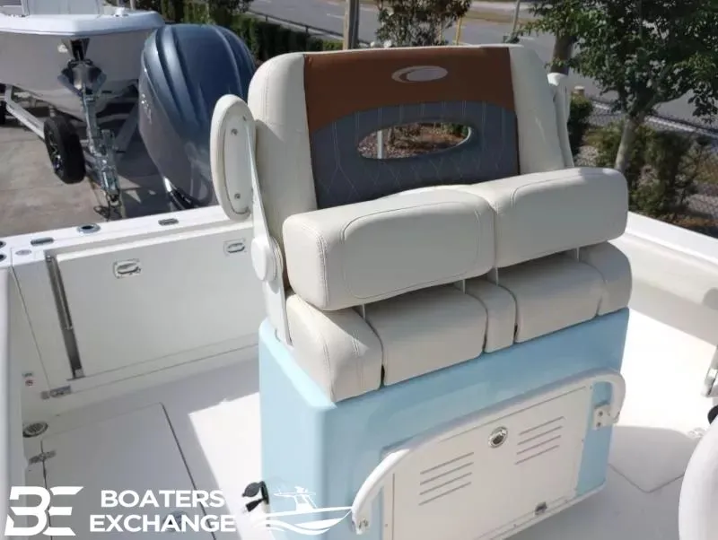 Slide: The Image of Cobia 240 Center Console 2022 boat seat with cushioning. - 5