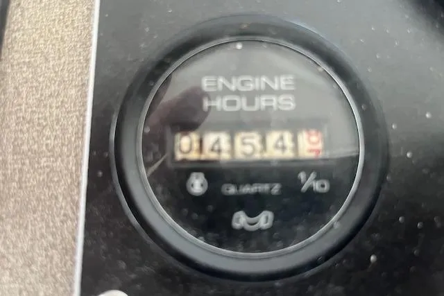 Slide: The Image of Engine hour meter showing 454 hours on 1985 Jamestowner 16 x 63 Houseboat. - 5