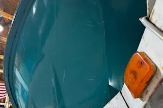 Slide: The Image of 1994 Sea-Doo SPX jet ski in a garage, close-up view. - 10