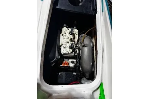 Slide: The Image of 1994 Sea-Doo SPX engine compartment, showcasing internal components and design. - 5