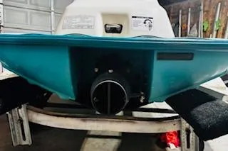 Slide: The Image of 1994 Sea-Doo SPX jet ski rear view in a garage setting. - 9