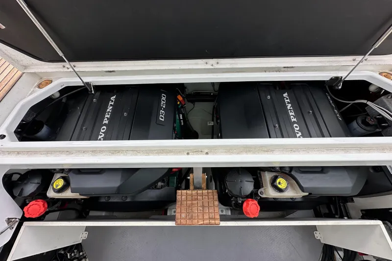 Slide: The Image of Engine compartment of a 2015 Jeanneau NC11 with Volvo Penta D3-200 engines. - 74