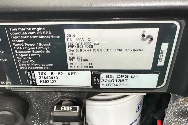 Slide: The Image of Label on a 2015 Jeanneau NC11 marine engine, showing compliance and specifications. - 75