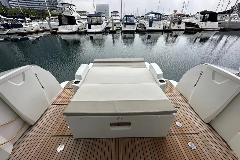 Slide: The Image of 2015 Jeanneau NC11 yacht with spacious deck at marina. - 83