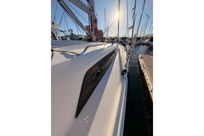 Slide: The Image of Beneteau Oceanis 30.1 sailboat docked at marina, 2020 model, sunlit deck view. - 14