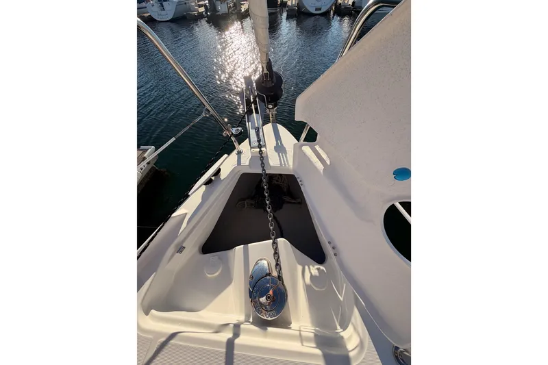 Slide: The Image of Beneteau Oceanis 30.1 sailboat deck, 2020 model, with anchor chain and winch. - 18