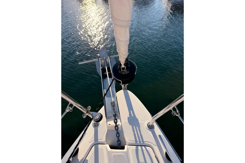 Slide: The Image of Bow view of 2020 Beneteau Oceanis 30.1 sailboat on calm water. - 19