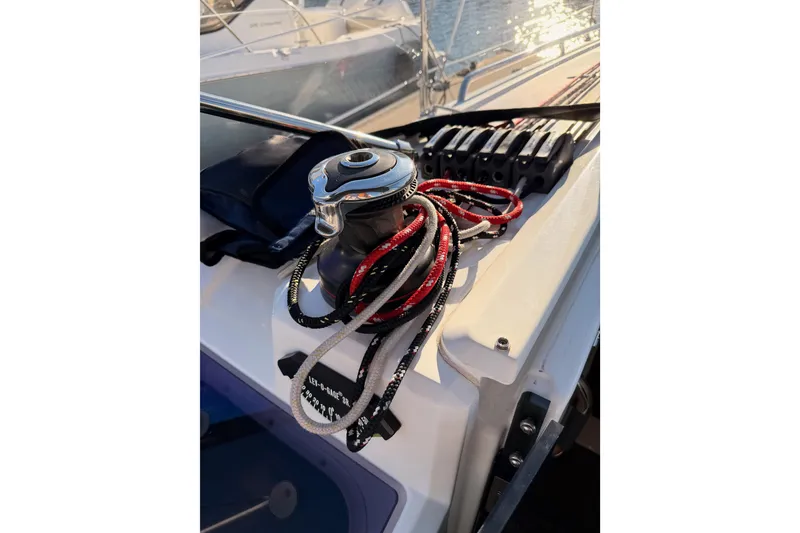 Slide: The Image of Winch and ropes on 2020 Beneteau Oceanis 30.1 sailboat deck. - 25