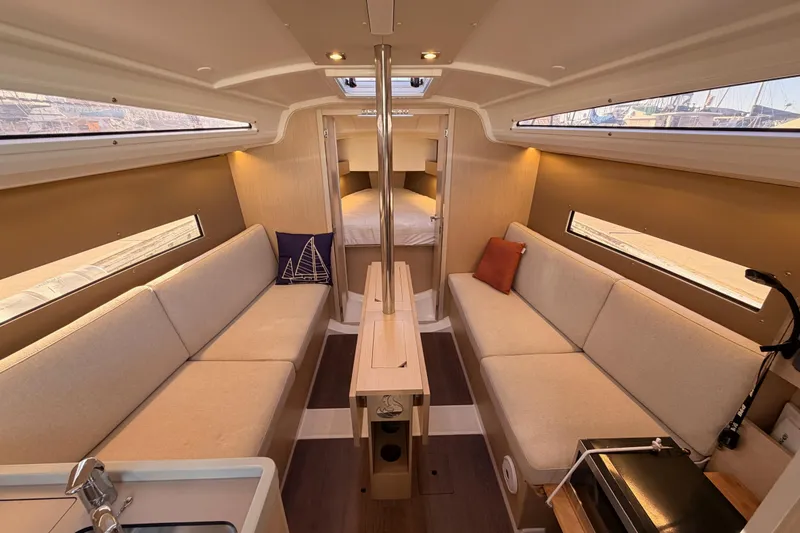 Slide: The Image of Interior of 2020 Beneteau Oceanis 30.1 yacht, featuring cozy seating and modern design. - 33