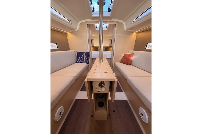 Slide: The Image of Interior of 2020 Beneteau Oceanis 30.1 yacht, featuring cozy seating and modern design. - 38