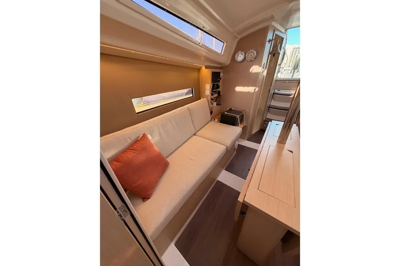 Slide: The Image of Interior of 2020 Beneteau Oceanis 30.1 yacht with cozy seating and modern design. - 45