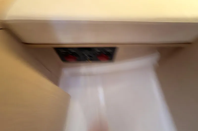 Slide: The Image of Blurry interior view of a 2020 Beneteau Oceanis 30.1 yacht cabin. - 50
