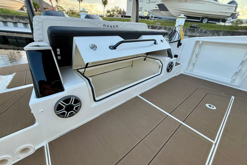 Slide: The Image of 2026 Navan S30 boat with open storage compartment and sleek deck design. - 12