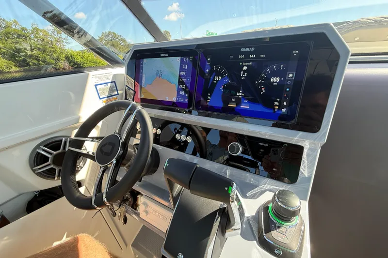 Slide: The Image of Interior dashboard of 2026 Navan S30 boat with advanced navigation displays. - 24