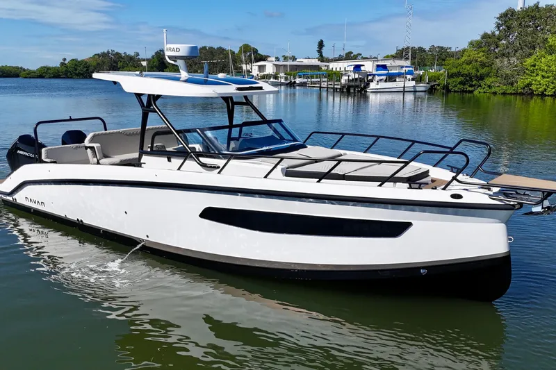 Slide: The Image of 2026 Navan S30 boat on calm water, featuring sleek design and modern amenities. - 4