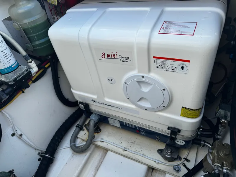 Slide: The Image of Fischer Panda generator in 2014 Pursuit OS 345 Offshore boat. - 18