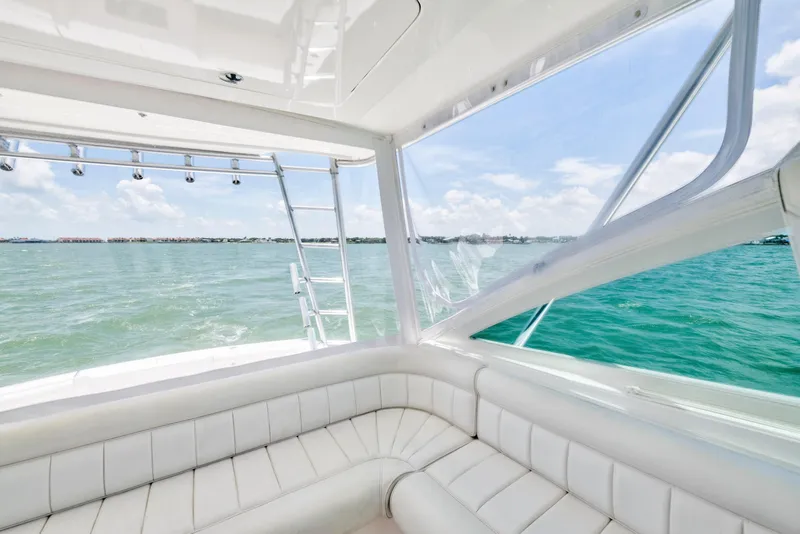 Slide: The Image of Interior view of 2010 Cabo 45 Express yacht with ocean backdrop. - 9