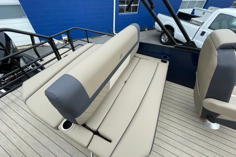 Slide: The Image of 2026 Starcraft EXS 5 Q DH boat interior with beige seating and modern design. - 14