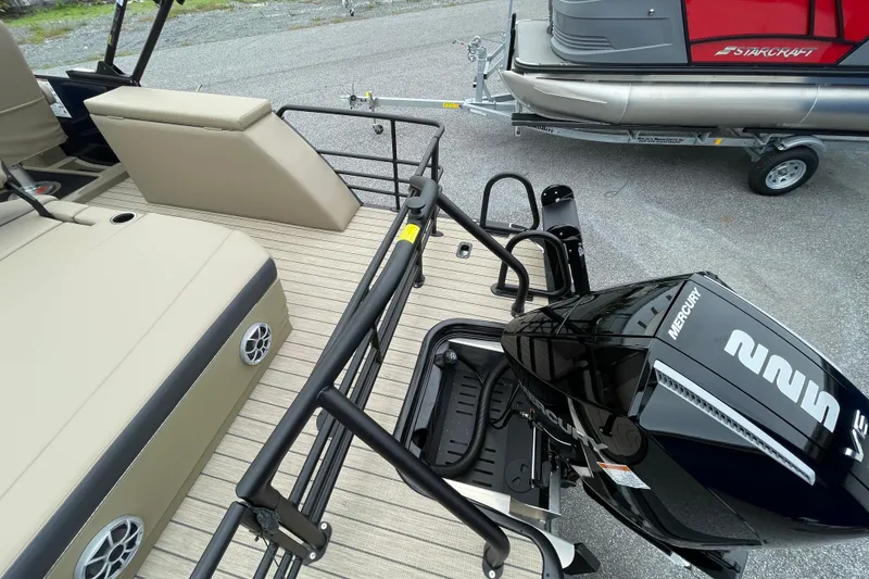 Slide: The Image of 2026 Starcraft EXS 5 Q DH boat interior with beige seating and modern design. - 18