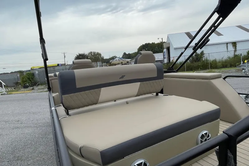 Slide: The Image of 2026 Starcraft EXS 5 Q DH pontoon boat with spacious seating and modern design. - 5