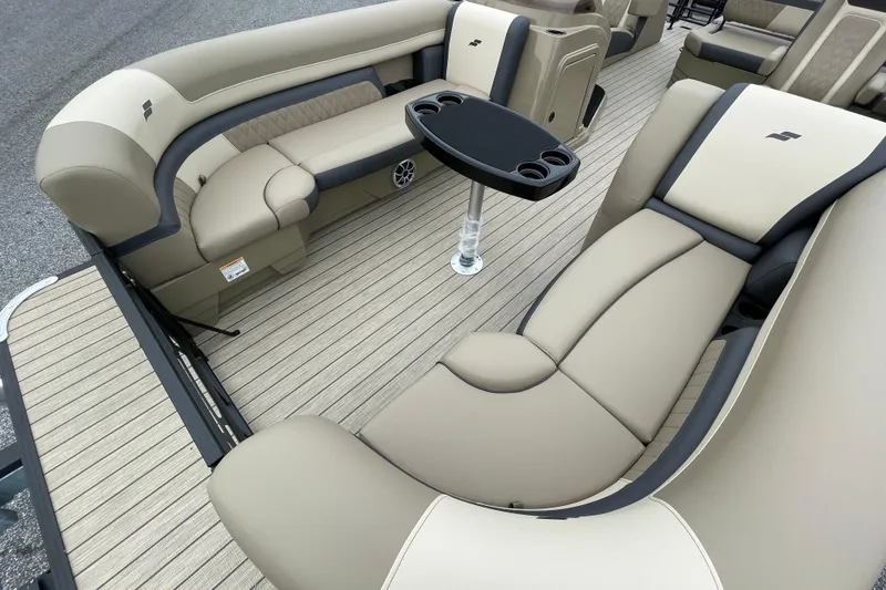Slide: The Image of Luxurious interior of 2026 Starcraft EXS 5 Q DH boat with plush seating and modern design. - 8