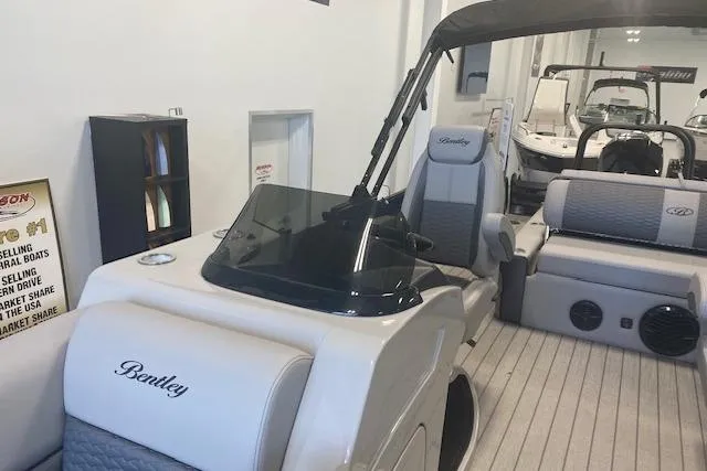 Slide: The Image of 2026 Bentley Pontoons Elite 223 Swingback interior with luxurious seating and modern design. - 14