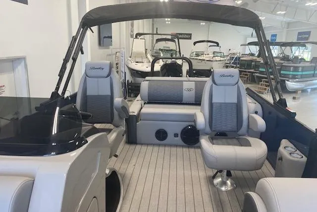 Slide: The Image of 2026 Bentley Pontoons Elite 223 Swingback interior with luxurious seating and modern design. - 15