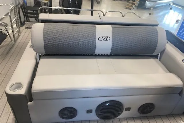 Slide: The Image of 2026 Bentley Pontoons Elite 223 Swingback interior with quilted seating and integrated speakers. - 21