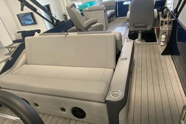 Slide: The Image of 2026 Bentley Pontoons Elite 223 Swingback interior with plush seating and modern design. - 23