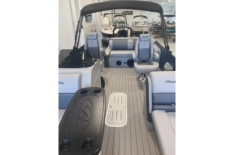 Slide: The Image of 2026 Bentley Pontoons Elite 223 Swingback interior with luxurious seating and modern design. - 6