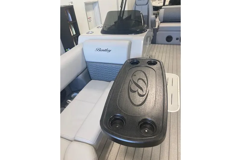 Slide: The Image of 2026 Bentley Pontoons Elite 223 Swingback interior with seating and table. - 7