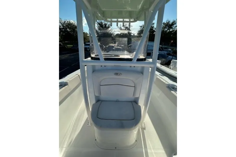 Slide: The Image of 2022 Sea Hunt Ultra 234 boat interior storage compartment. - 13