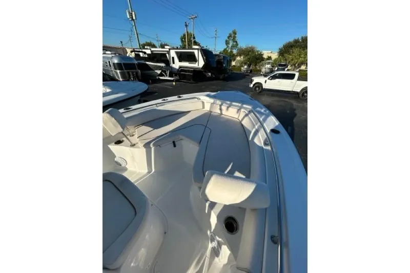 Slide: The Image of JL Audio system on 2022 Sea Hunt Ultra 234 boat dashboard. - 15
