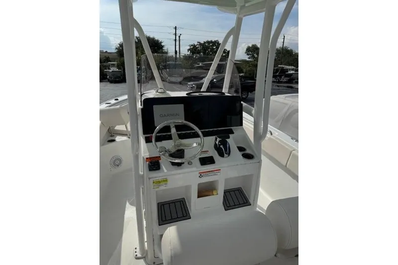 Slide: The Image of 2022 Sea Hunt Ultra 234 boat console with Garmin navigation system. - 22