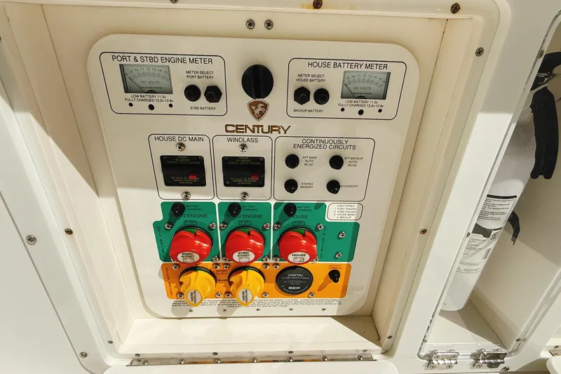 Slide: The Image of Control panel of a 2016 Century 2600 Walkaround boat, featuring engine and battery meters. - 11