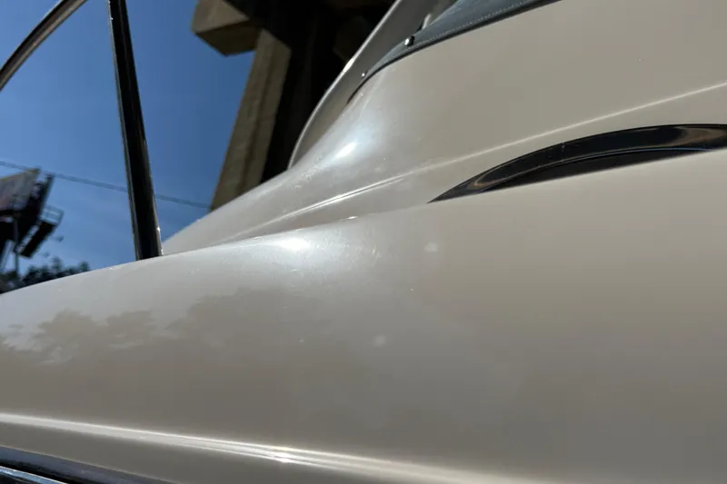 Slide: The Image of Close-up of a 2016 Century 2600 Walkaround boat's sleek exterior design. - 32