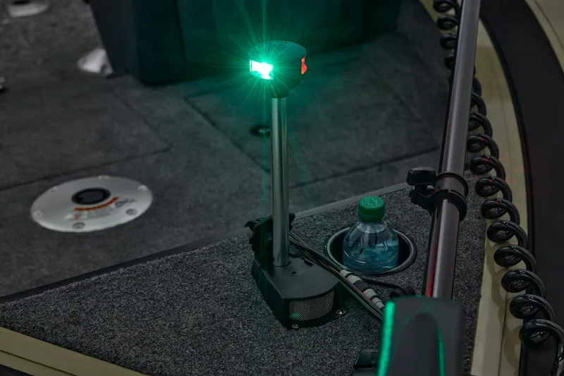 Slide: The Image of 2026 Tracker Targa V-18 Combo dashboard with audio controls and ignition keys. - 16