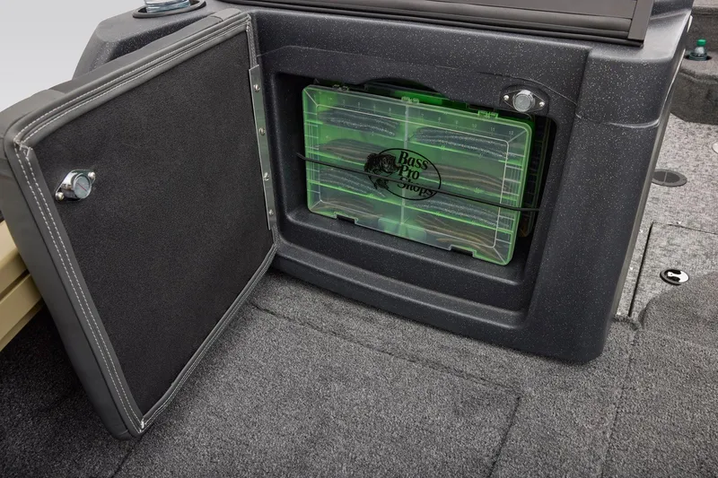 Slide: The Image of Interior of 2026 Tracker Targa V-18 Combo boat with storage compartments and accessories. - 23