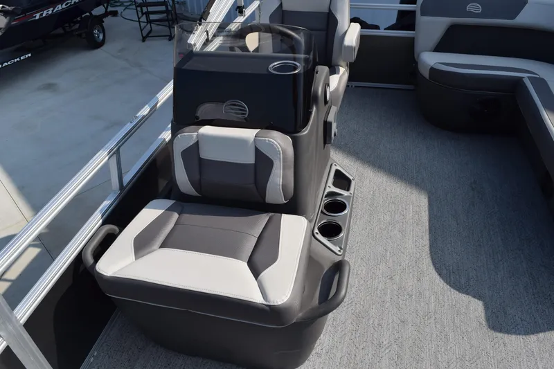 Slide: The Image of 2026 Sun Tracker Bass Buggy 16 XL Select interior seating with cup holders. - 4