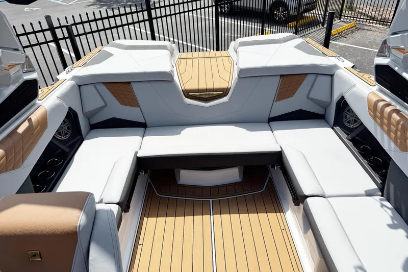 Slide: The Image of 2025 Nautique Super Air Nautique S21 interior with luxurious seating and modern design. - 7