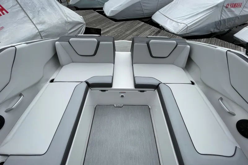 Slide: The Image of 2026 Yamaha AR250 boat interior with sleek, modern seating design. - 13