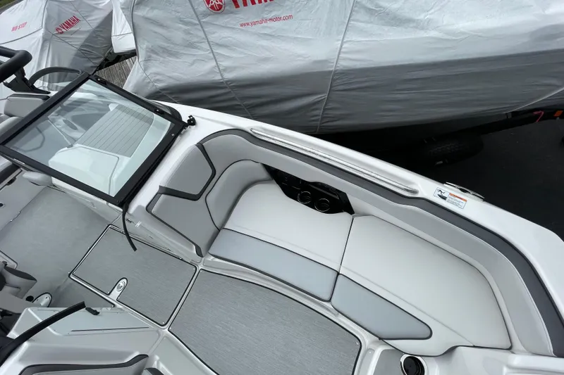 Slide: The Image of 2026 Yamaha AR250 boat interior with sleek seating and modern design. - 6