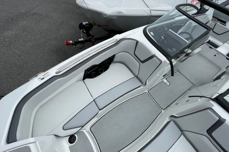 Slide: The Image of 2026 Yamaha AR250 boat interior with sleek seating and modern design. - 7